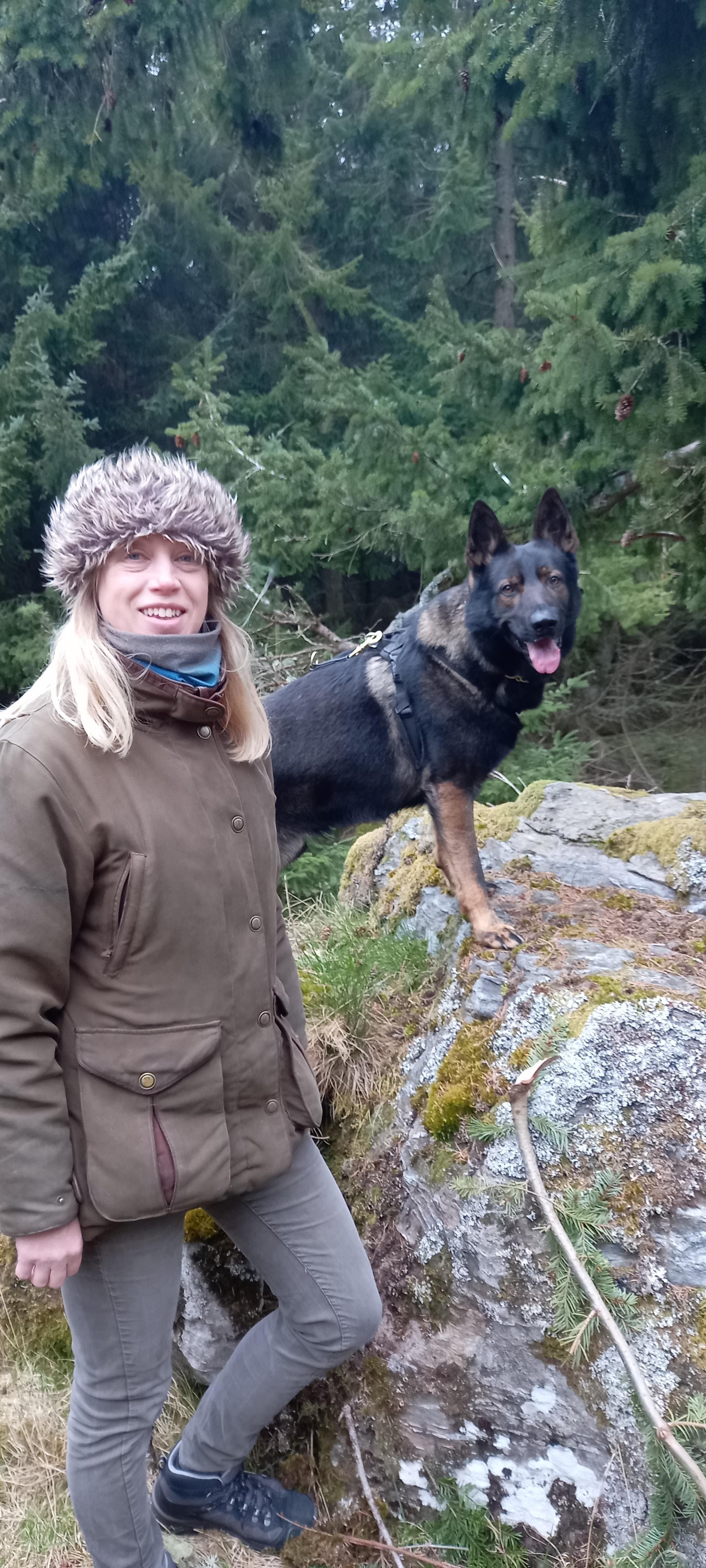 Marie Butler with Bodie on a woodland walk